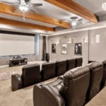 view of large theater room with seating and projector screen